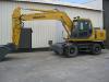 КОЛЕСНЫЙ ЭКСКАВАТОР KOMATSU  - Россия